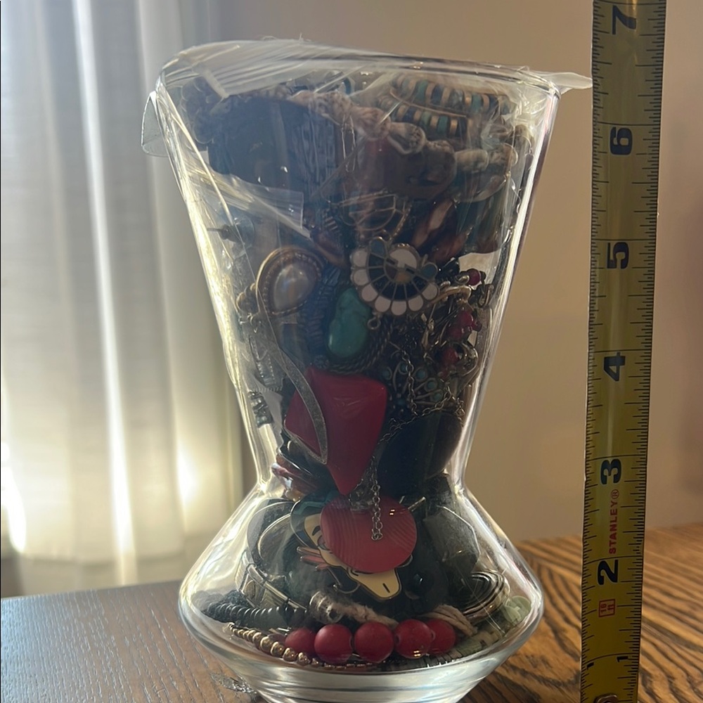 Assorted Jewelry Collection in Glass Vase